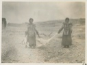 Image of Swan carried by Eskimo [Inuit] girls